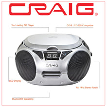 Load image into Gallery viewer, Craig CD6925BT-SL Portable Top-Loading Stereo CD Boombox with AM/FM Stereo Radio and Bluetooth Wireless Technology in Silver | LED Display | Programmable CD Player | CD-R/CD-W Compatible | AUX in Port |
